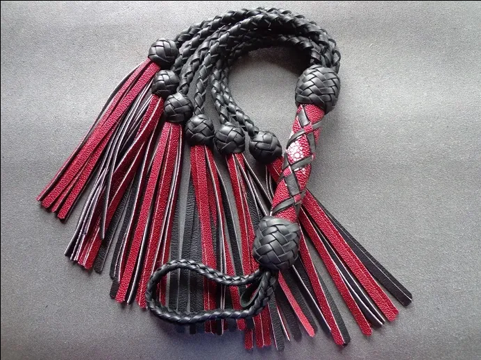 (Above) Single braided whip with red and black tassels. (#set005)
