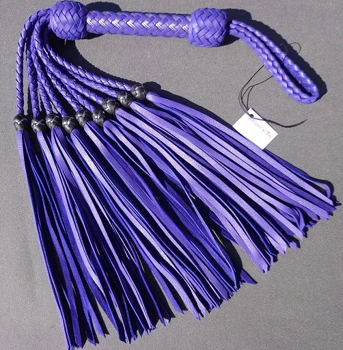 (Above) Single purple braided leather flogger. (#set007)
